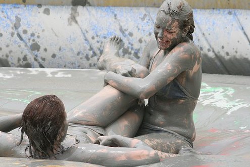 Hot chicks fighting in mud  