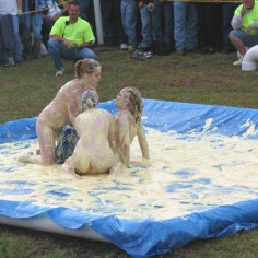 Girls in the mud, jelly and pudding  